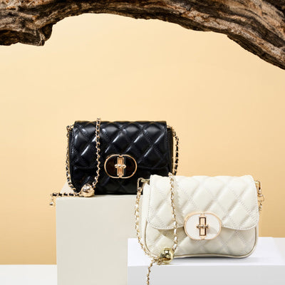 Valersia Chic Allure Crossbody | Quilted shoulder bag with chain and oval clasp