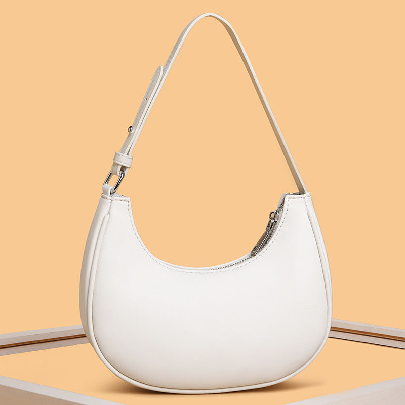 Valersia Half-moon shaped leather bag | Modern design with adjustable shoulder strap